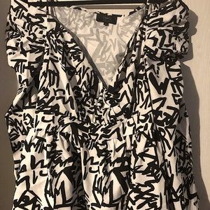 Beautiful Black/White Cold Shoulder blouse!   Side closure.  New/ no tags.